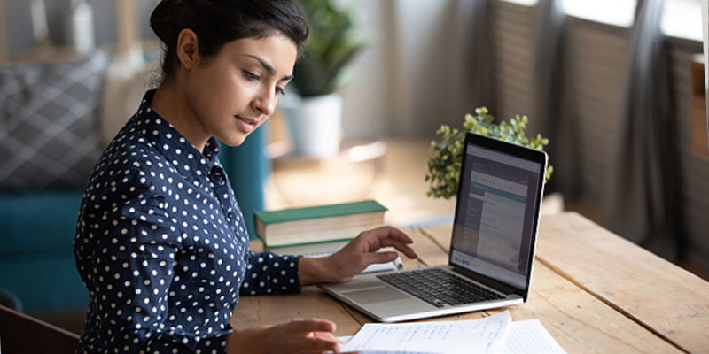 woman watching demo while filing return